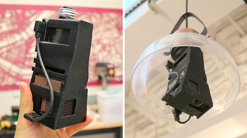 Illustration for article titled Screwing In This Lightbulb Turns Your Entire Desk Into a Touchscreen Smartphone